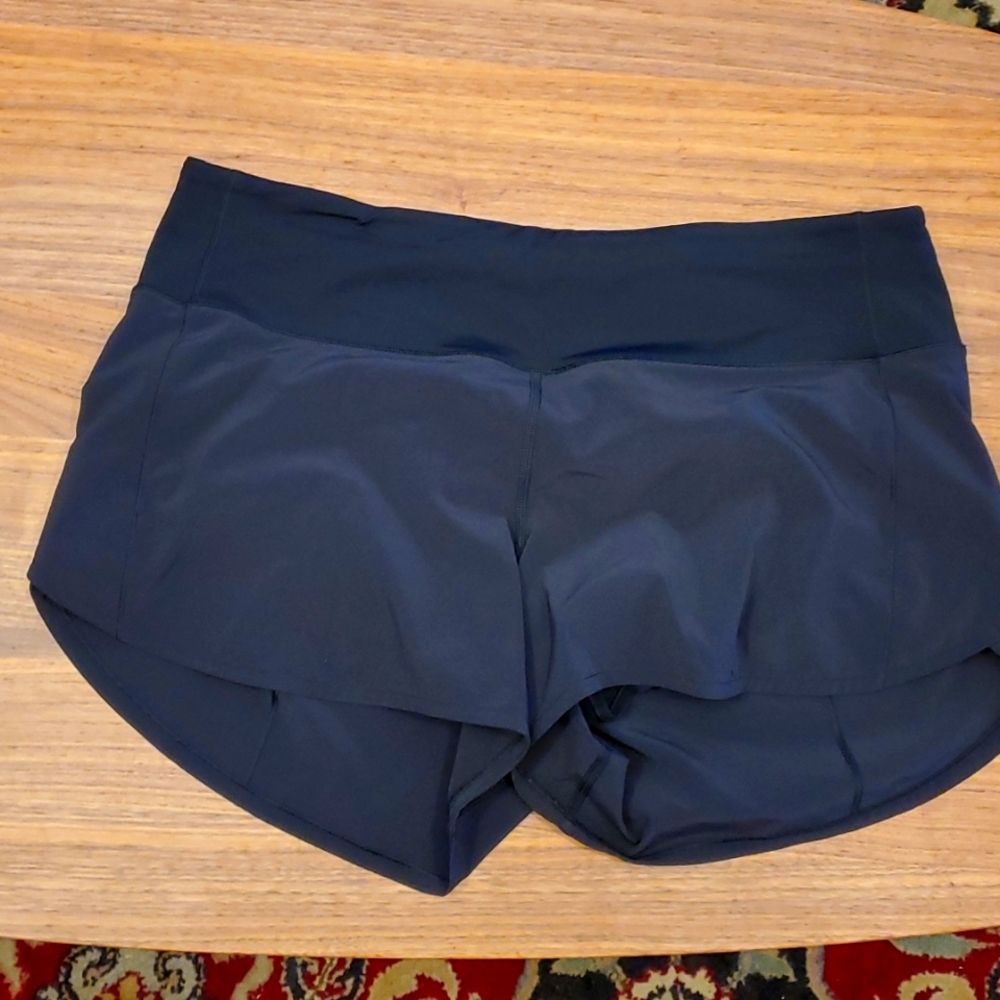 Lululemon Speed Up Short size 10 tall, 4" inseam, excellent pre-owned condition